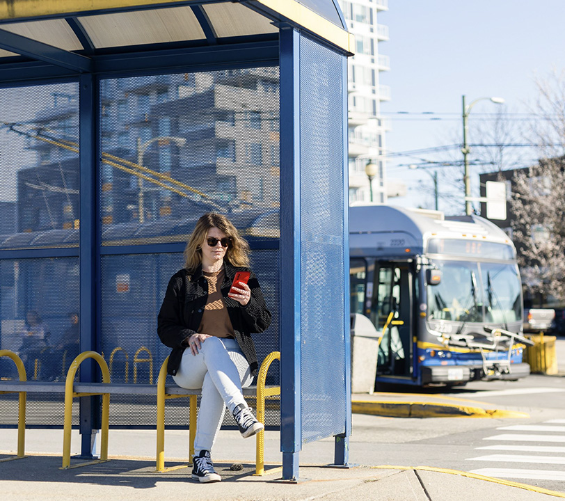 Woman at bus stop